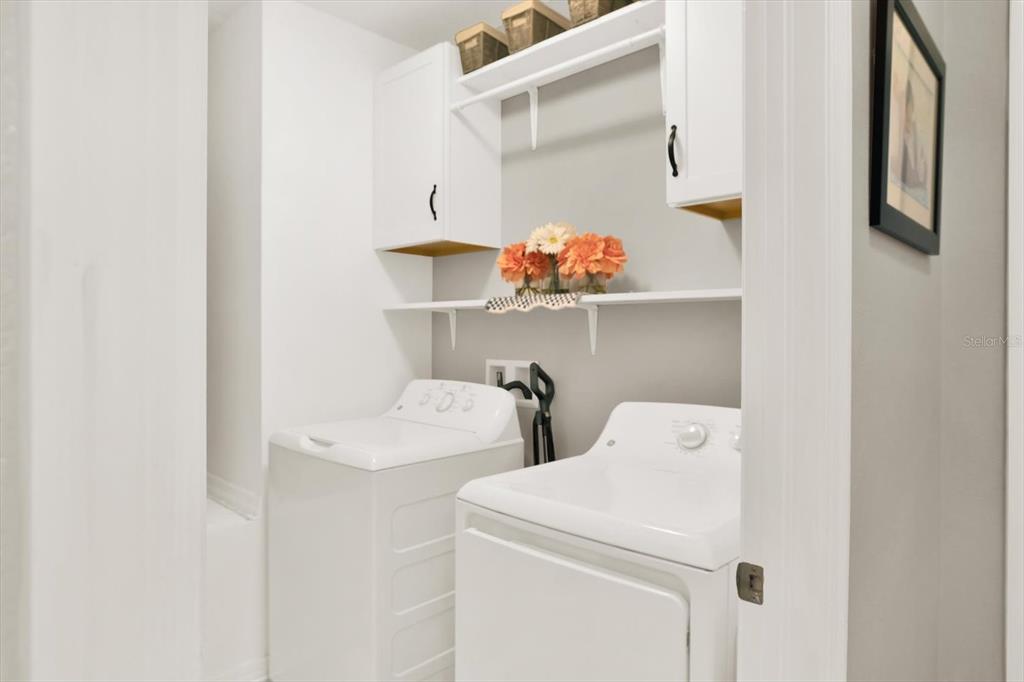 12103 Gothic Rd Spring Hill Spring Hill, FL 34610 - Photo 25 of 44 a utility room with dryer and washer