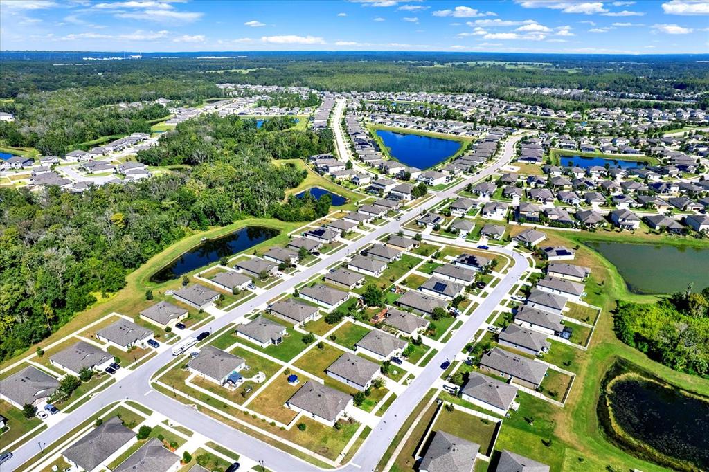 12103 Gothic Rd Spring Hill Spring Hill, FL 34610 - Photo 37 of 44 a view of a city with tall buildings