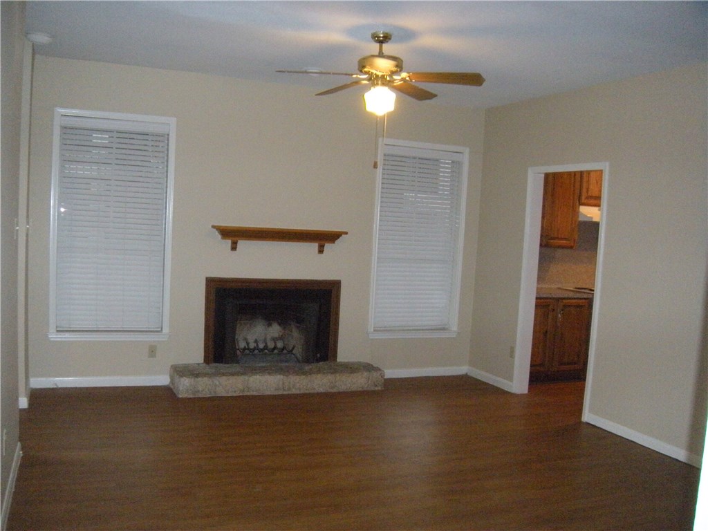 2529 Rio Grande Street, Unit 57 Austin, TX 78705 - Photo 2 of 20 a living room with a fireplace