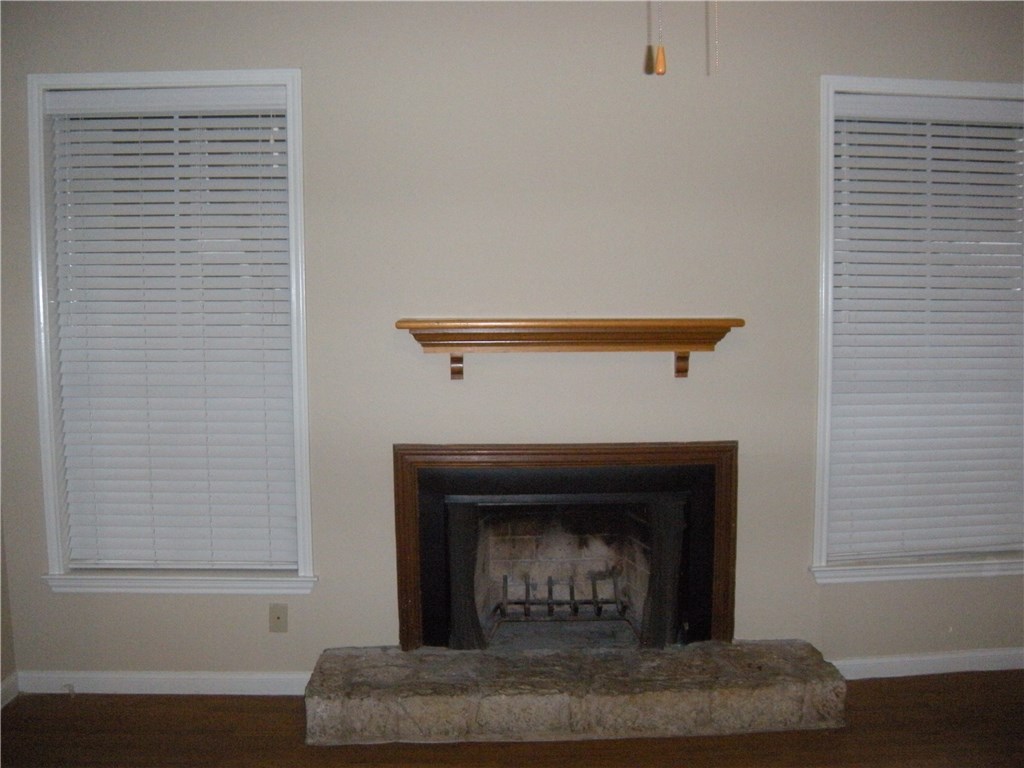 2529 Rio Grande Street, Unit 57 Austin, TX 78705 - Photo 3 of 20 a living room with a fireplace