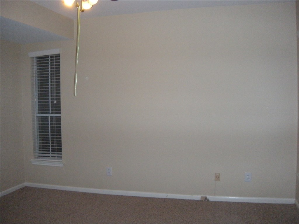 2529 Rio Grande Street, Unit 57 Austin, TX 78705 - Photo 9 of 20 a room that has a window in it