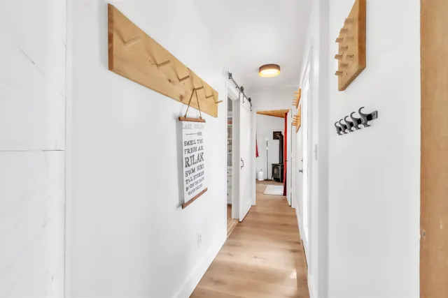 a bedroom with a bed and a view of bathroom