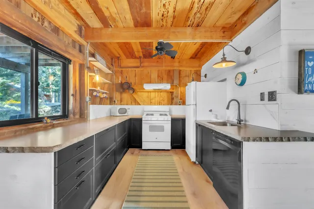 a lobby with furniture and wooden floor