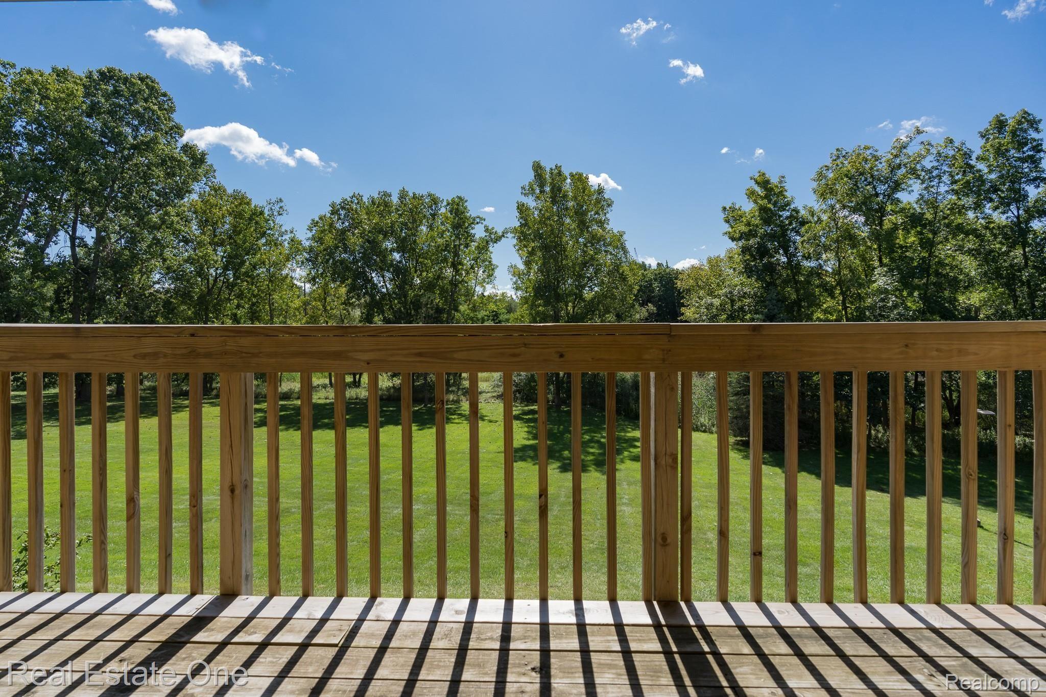 1677 Riverside Drive, Unit 16 Rochester, MI 48309 - Photo 9 of 31 FANTASTIC VIEWS: PROPERTY BACKS TO THE CLINTON RIVER - 1677 Riverside MLS-W020.jpg