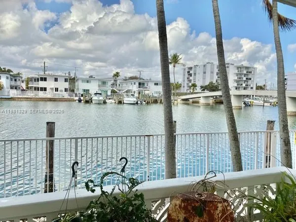 a view of a balcony with sitting area