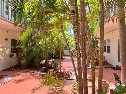 a porch with seating space and shower