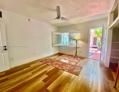 a view of a balcony with sitting area
