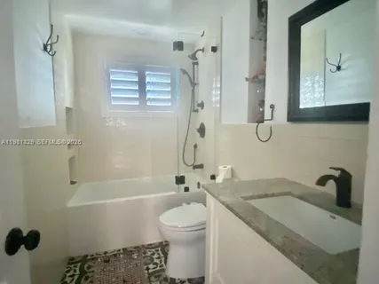 $375,000 | 8040 Tatum Waterway Drive, Unit 5, Miami Beach, FL 33141