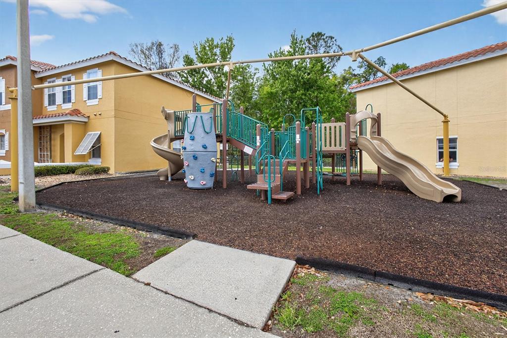 1066 Park Ridge Circle Kissimmee, FL 34746 - Photo 13 of 49 a view of a back yard of the house