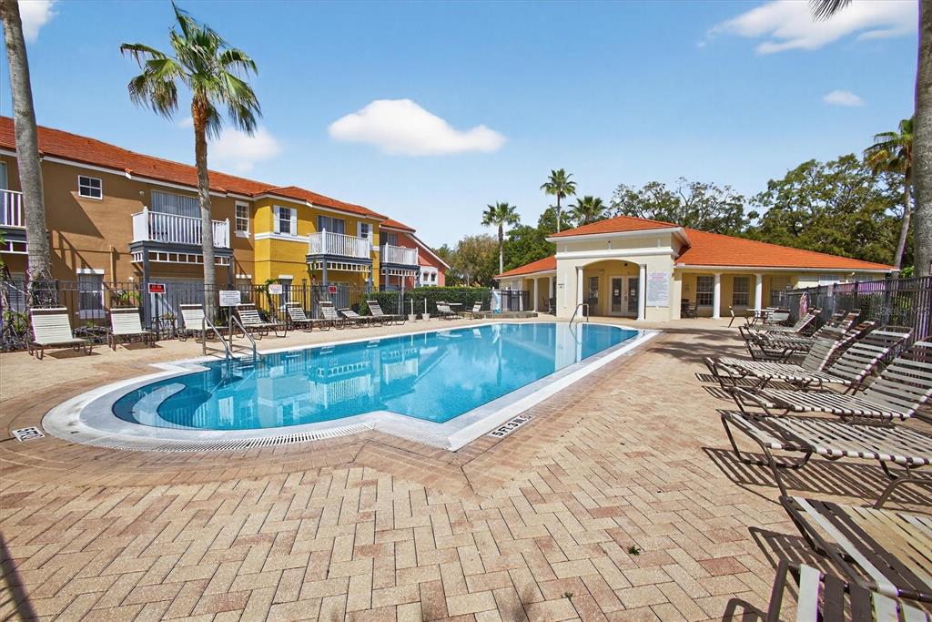 1066 Park Ridge Circle Kissimmee, FL 34746 - Photo 16 of 49 a view of a house with a swimming pool