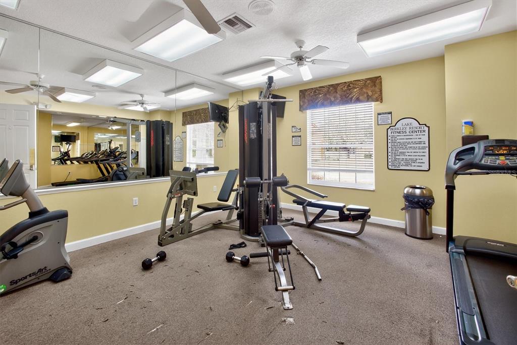 1066 Park Ridge Circle Kissimmee, FL 34746 - Photo 17 of 49 a view of a room with gym equipment