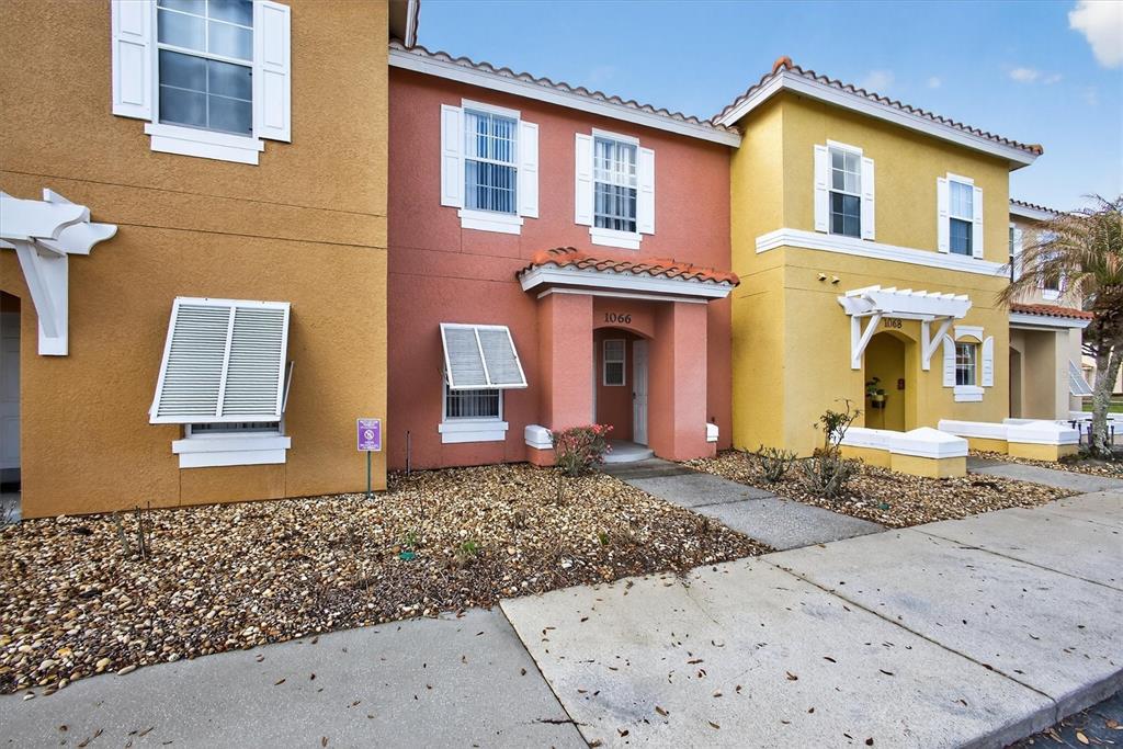 1066 Park Ridge Circle Kissimmee, FL 34746 - Photo 2 of 49 a front view of a house
