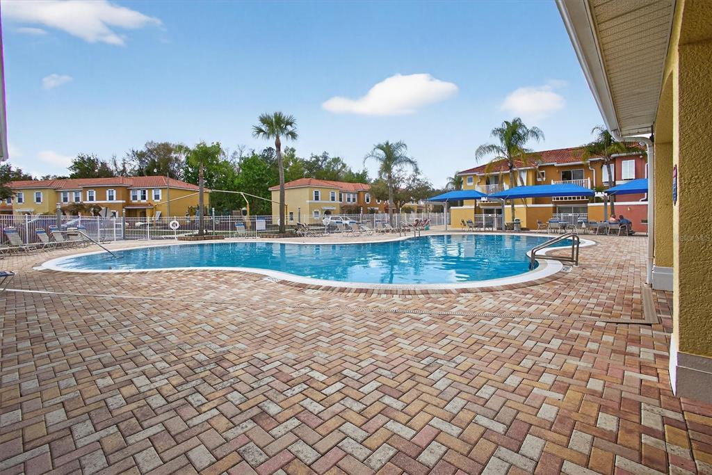 1066 Park Ridge Circle Kissimmee, FL 34746 - Photo 21 of 49 a view of a swimming pool and an outdoor space