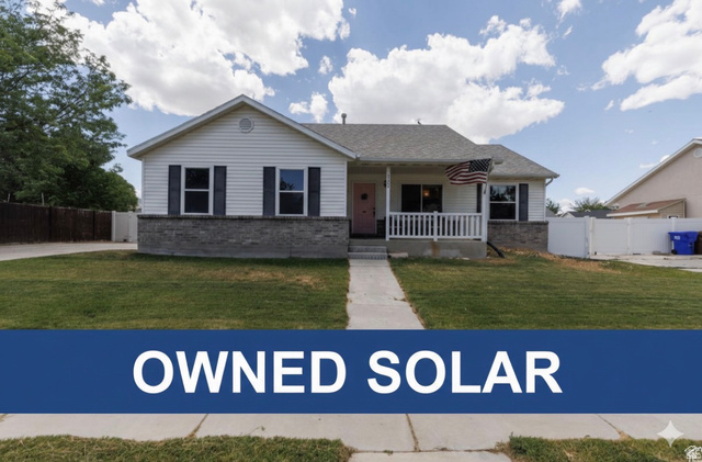 2142 East Fall Street Eagle Mountain, UT 84005 - Photo 1 of 1 View of front facade with a porch and brick siding