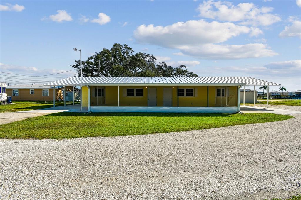 337 4th Street West, Unit A Palmetto, FL 34221 - Photo 1 of 25 a view of an house with a garden
