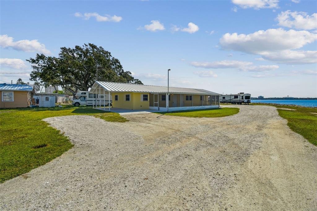 337 4th Street West, Unit A Palmetto, FL 34221 - Photo 25 of 25 a view of a swimming pool with a yard