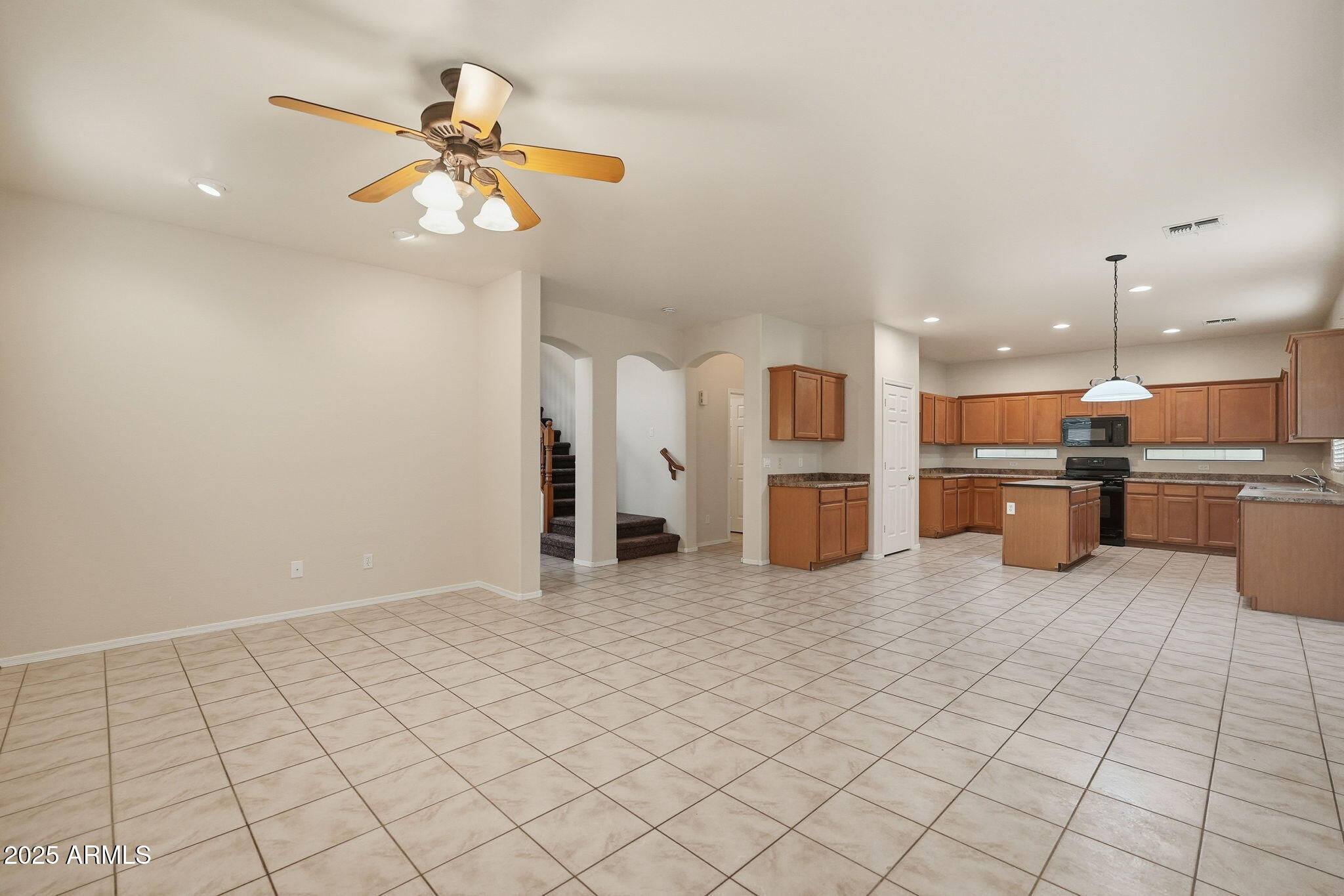 26913 North 85th Drive Peoria, AZ 85383 - Photo 11 of 48 a view of a kitchen with furniture and an empty room