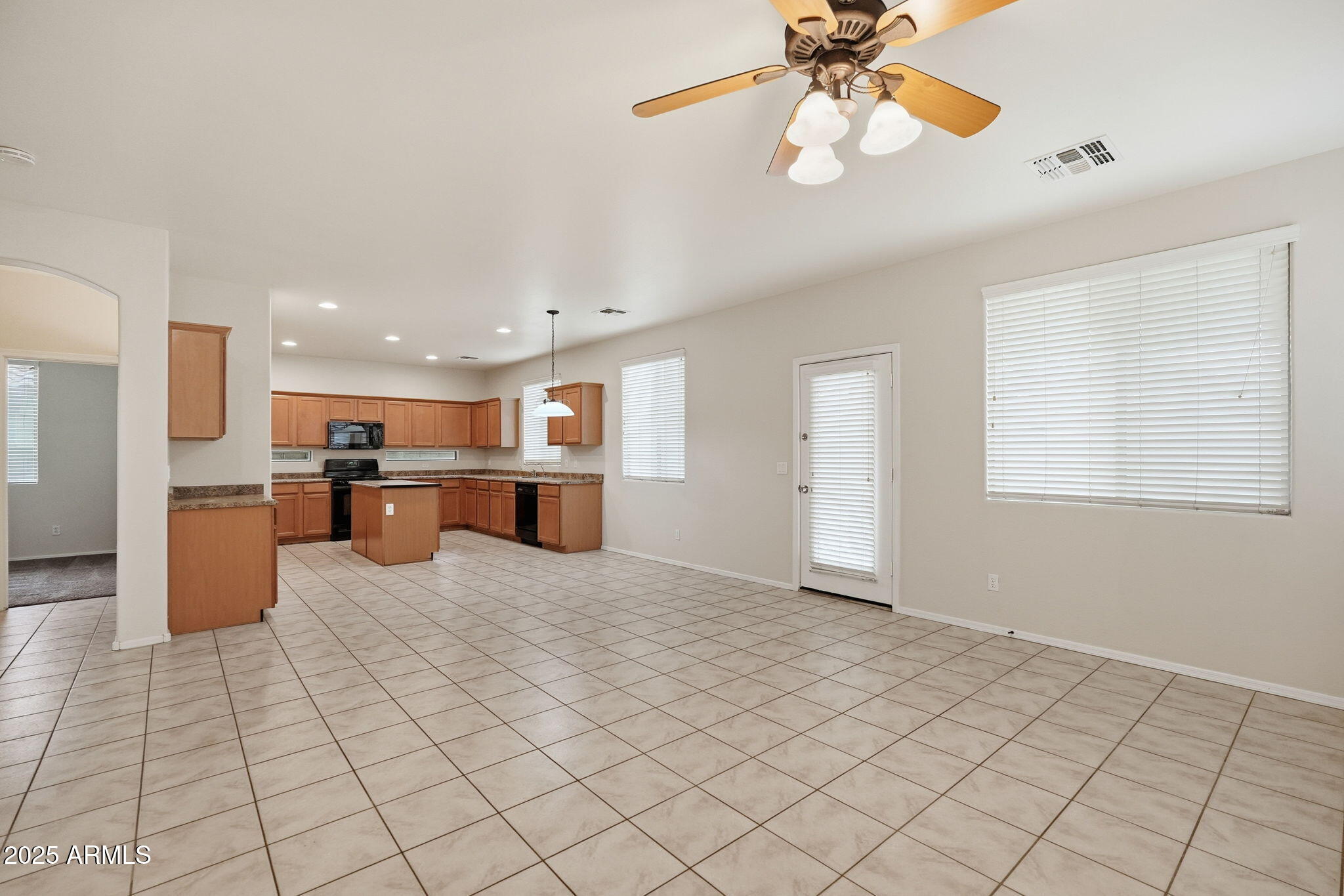 26913 North 85th Drive Peoria, AZ 85383 - Photo 12 of 48 a view of kitchen with furniture and refrigerator