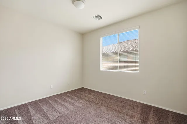a kitchen with stainless steel appliances granite countertop a sink and dishwasher stove with wooden cabinets