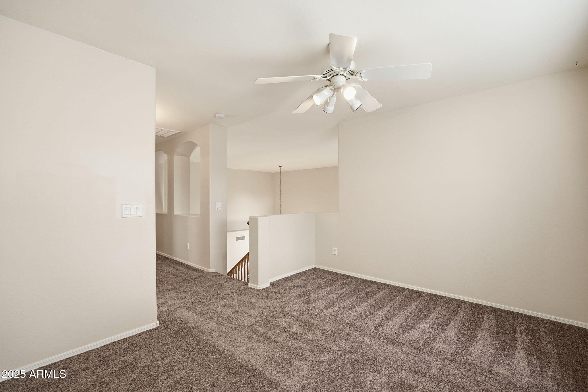 26913 North 85th Drive Peoria, AZ 85383 - Photo 24 of 48 an empty room with a empty space and a ceiling fan