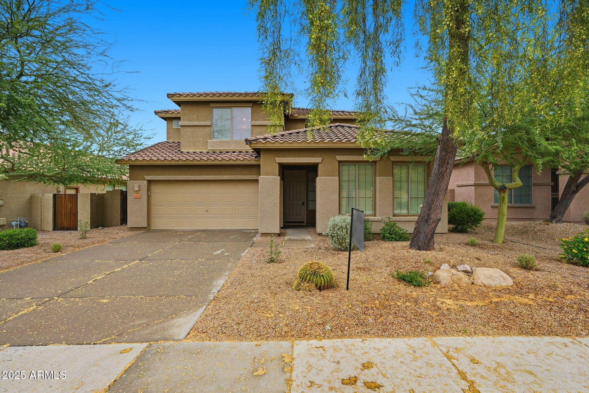 26913 North 85th Drive Peoria, AZ 85383 - Photo 2 of 48 a front view of a house with garden