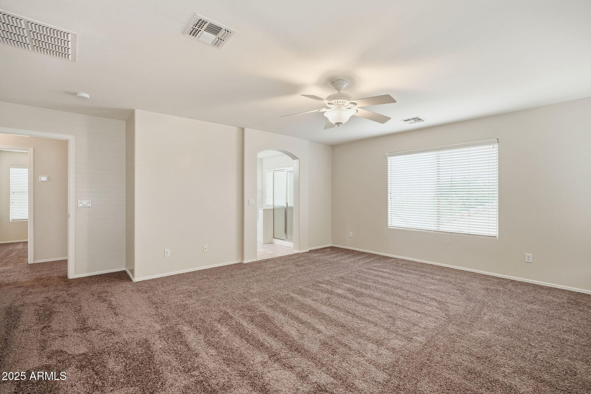 26913 North 85th Drive Peoria, AZ 85383 - Photo 28 of 48 a view of an empty room with a window