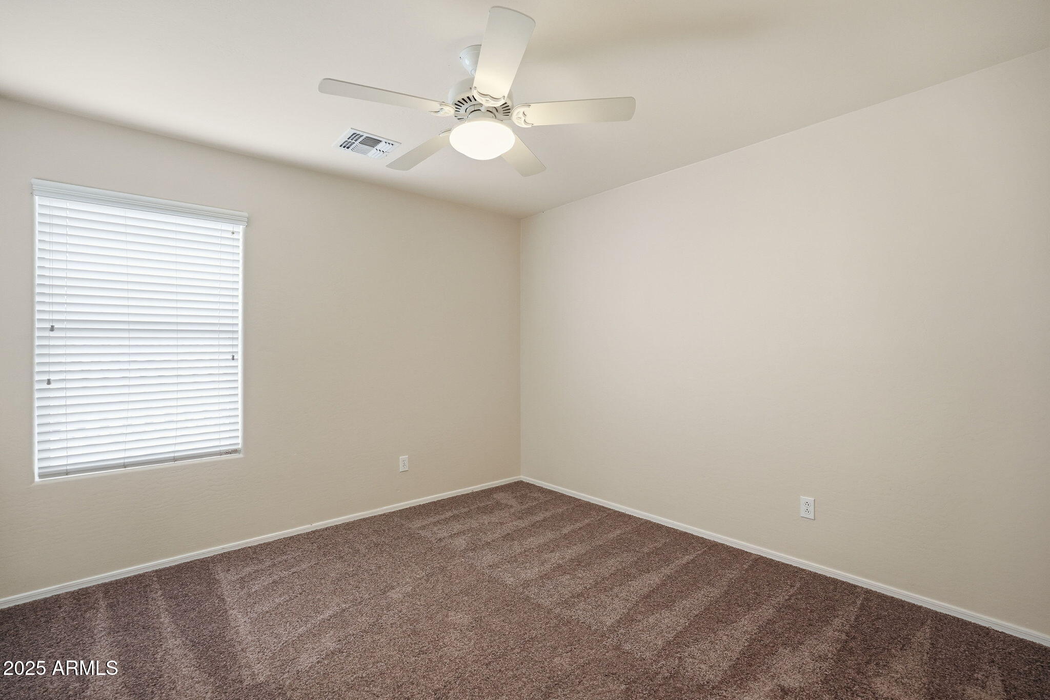26913 North 85th Drive Peoria, AZ 85383 - Photo 29 of 48 an empty room with a window