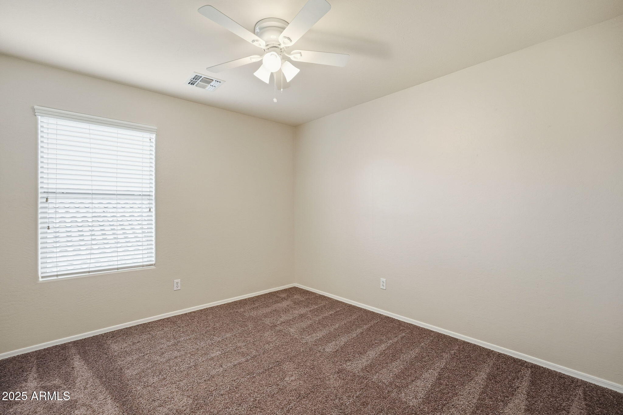 26913 North 85th Drive Peoria, AZ 85383 - Photo 31 of 48 an empty room with a window