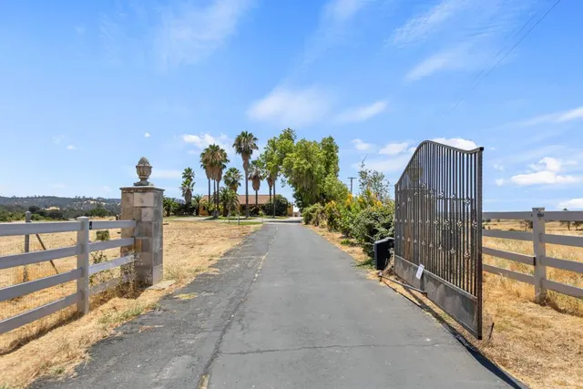 a view of a pathway with a building in the background