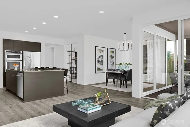 a living room with furniture and a table