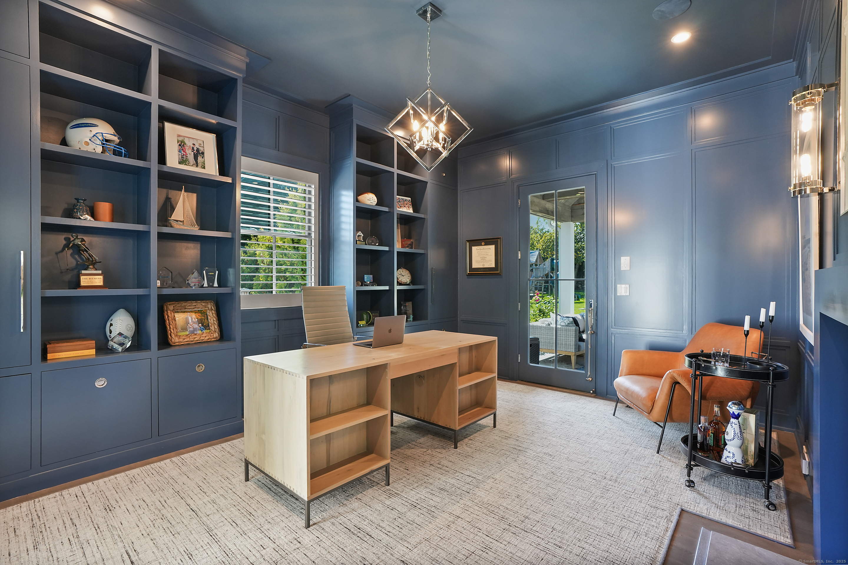 9 Burr Farms Road Westport, CT 06880 - Photo 11 of 40 a living room with furniture cabinets and window
