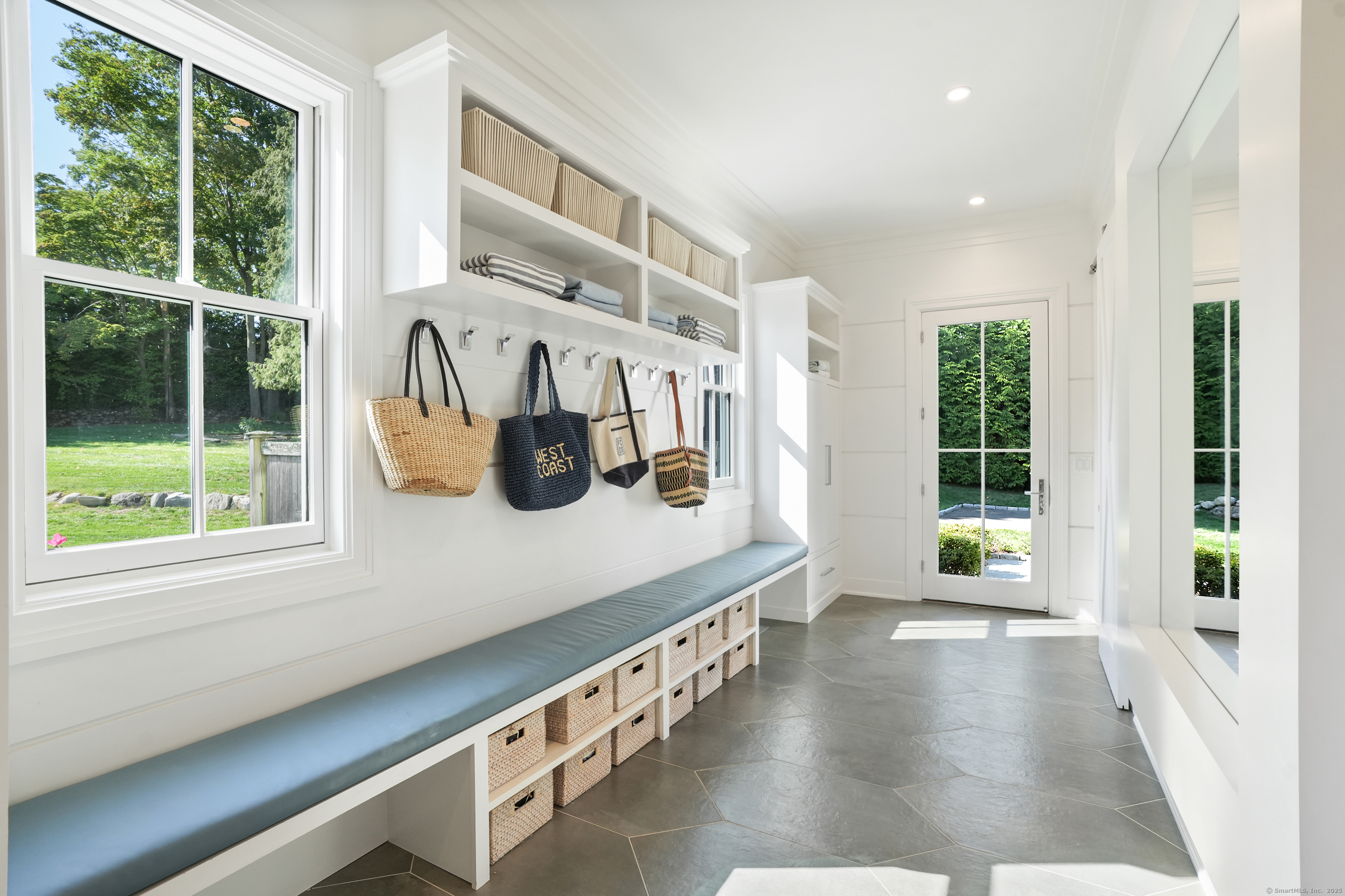 9 Burr Farms Road Westport, CT 06880 - Photo 13 of 40 a view of an entryway with wooden floor
