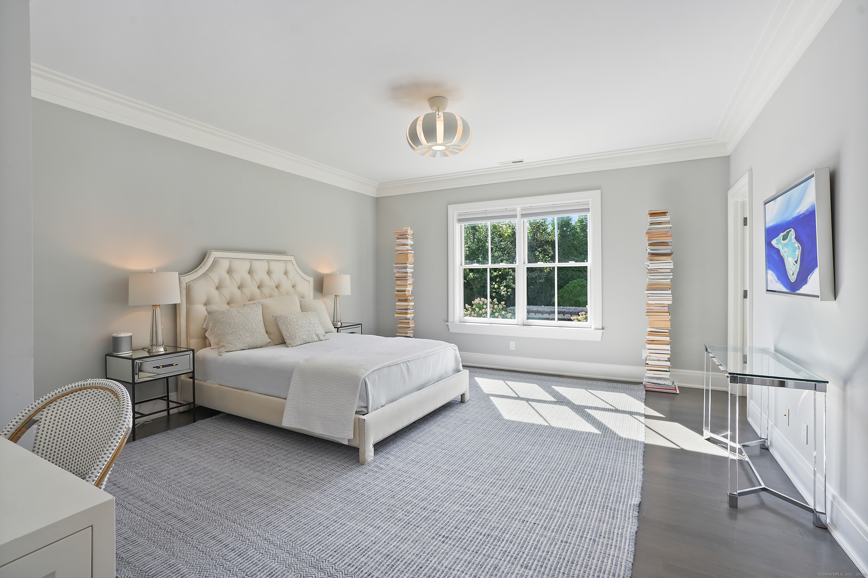 9 Burr Farms Road Westport, CT 06880 - Photo 17 of 40 a bedroom with a bed couch and a window