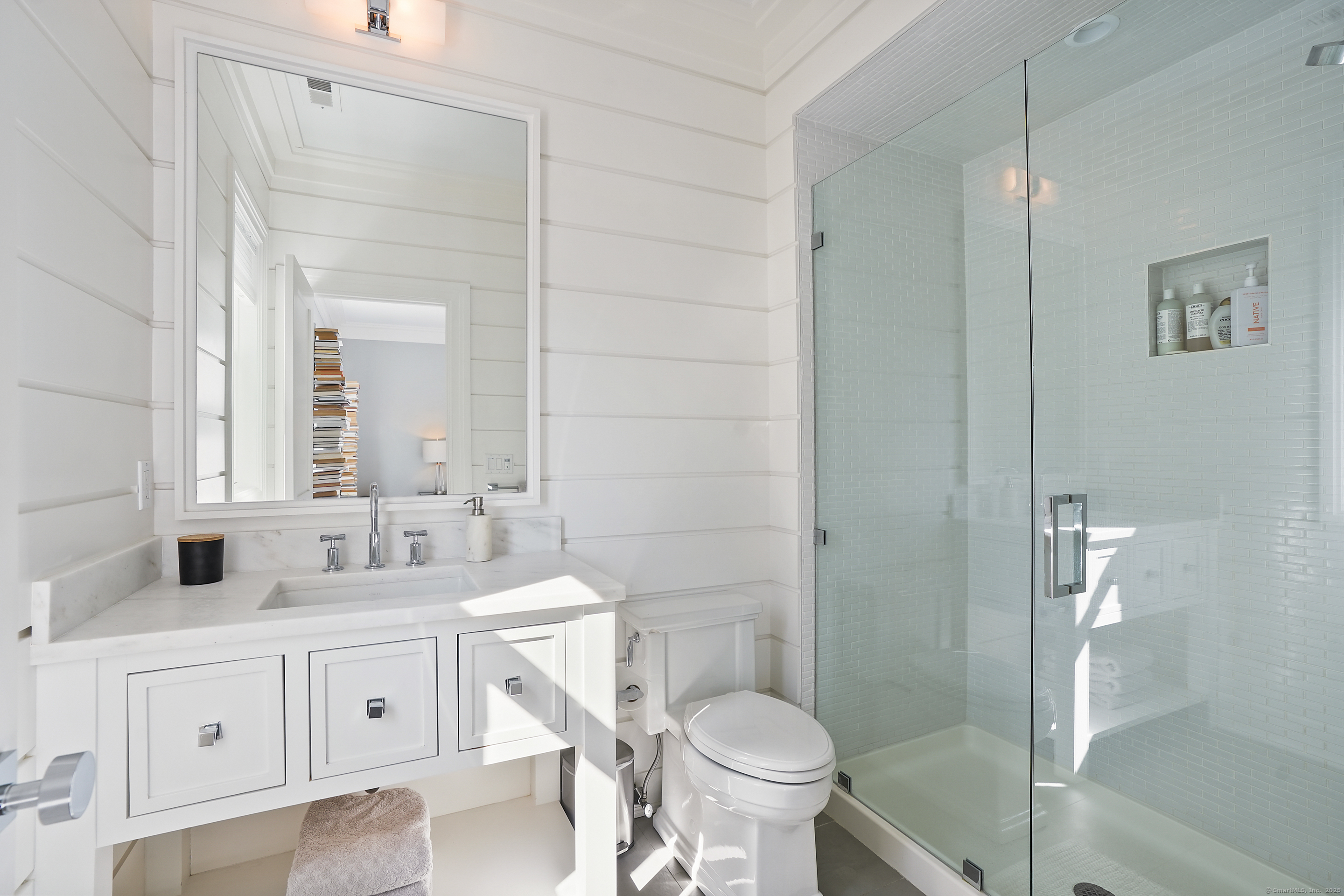 9 Burr Farms Road Westport, CT 06880 - Photo 18 of 40 a bathroom with a double vanity sink mirror and toilet