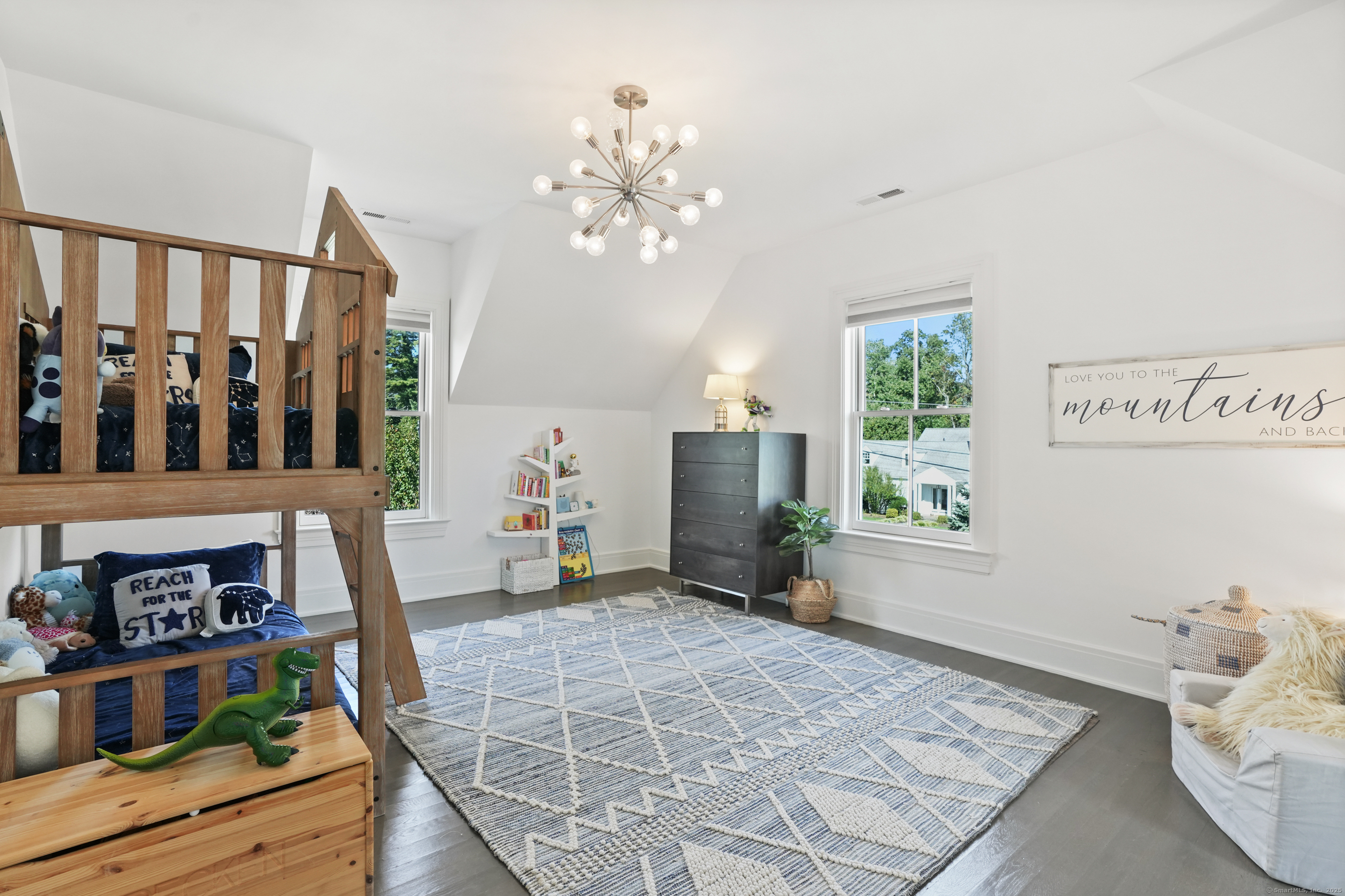 9 Burr Farms Road Westport, CT 06880 - Photo 22 of 40 a bedroom with furniture and a window