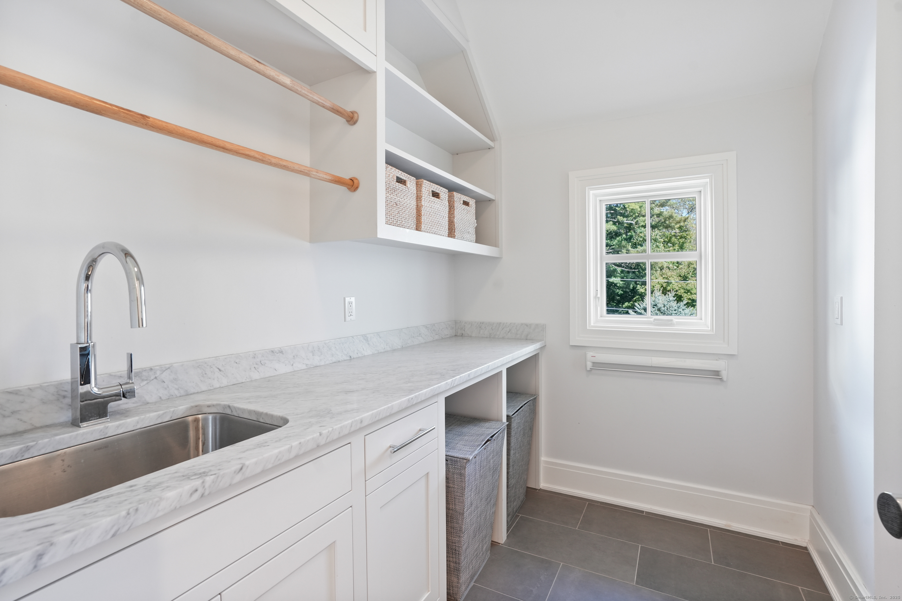 9 Burr Farms Road Westport, CT 06880 - Photo 24 of 40 a kitchen with a sink and a window