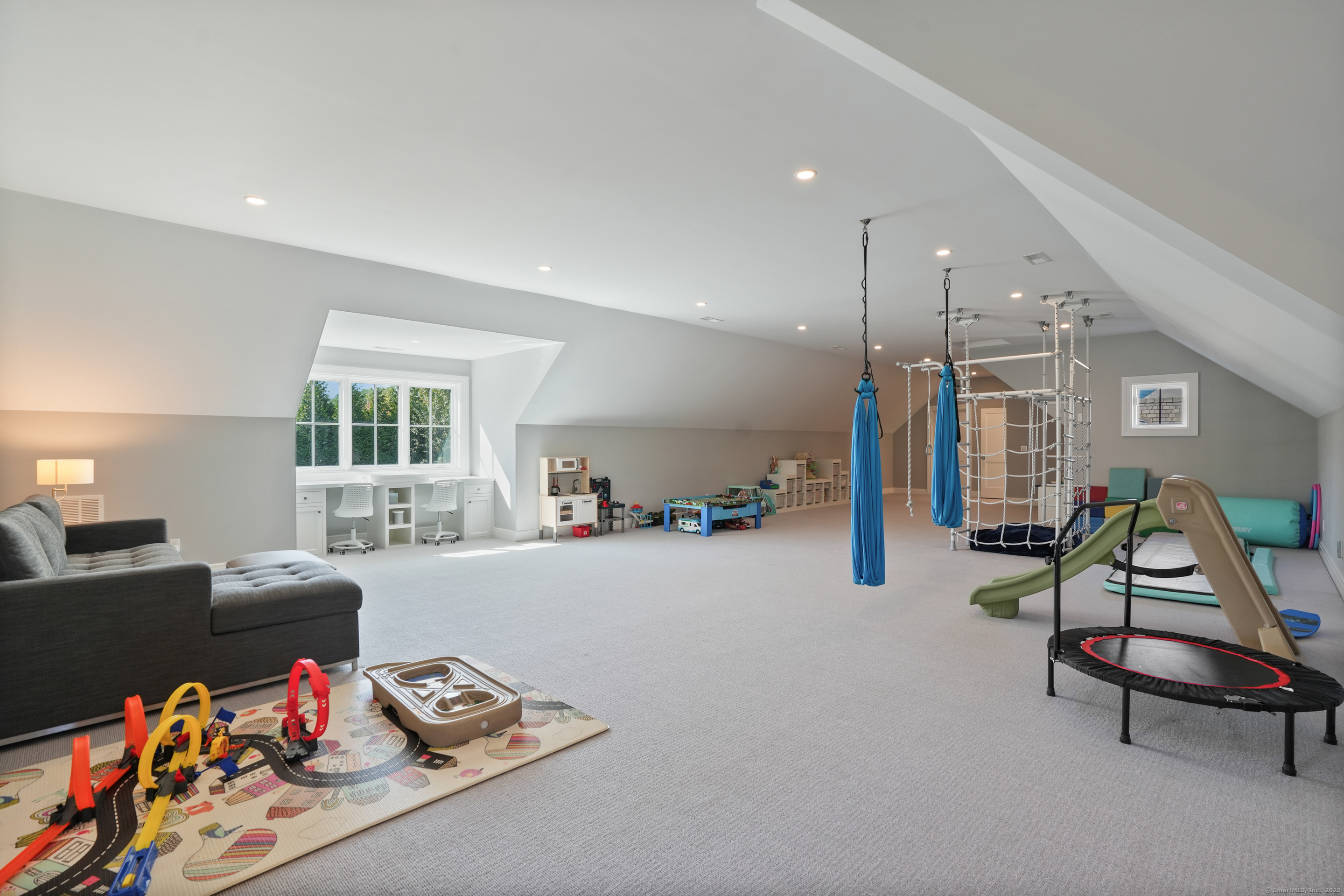 9 Burr Farms Road Westport, CT 06880 - Photo 25 of 40 a bedroom with furniture and a wooden floor