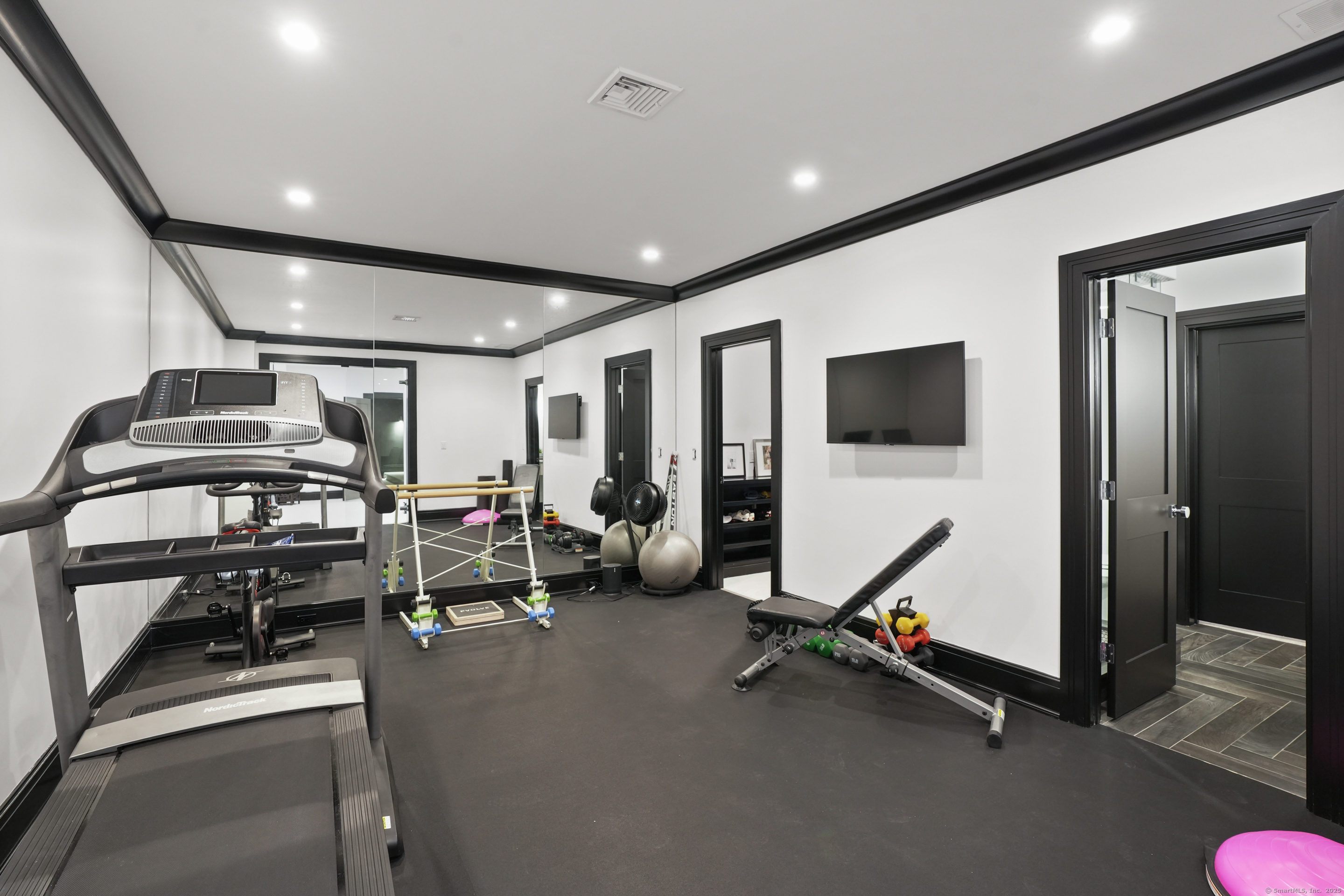 9 Burr Farms Road Westport, CT 06880 - Photo 29 of 40 a view of a room with gym equipment