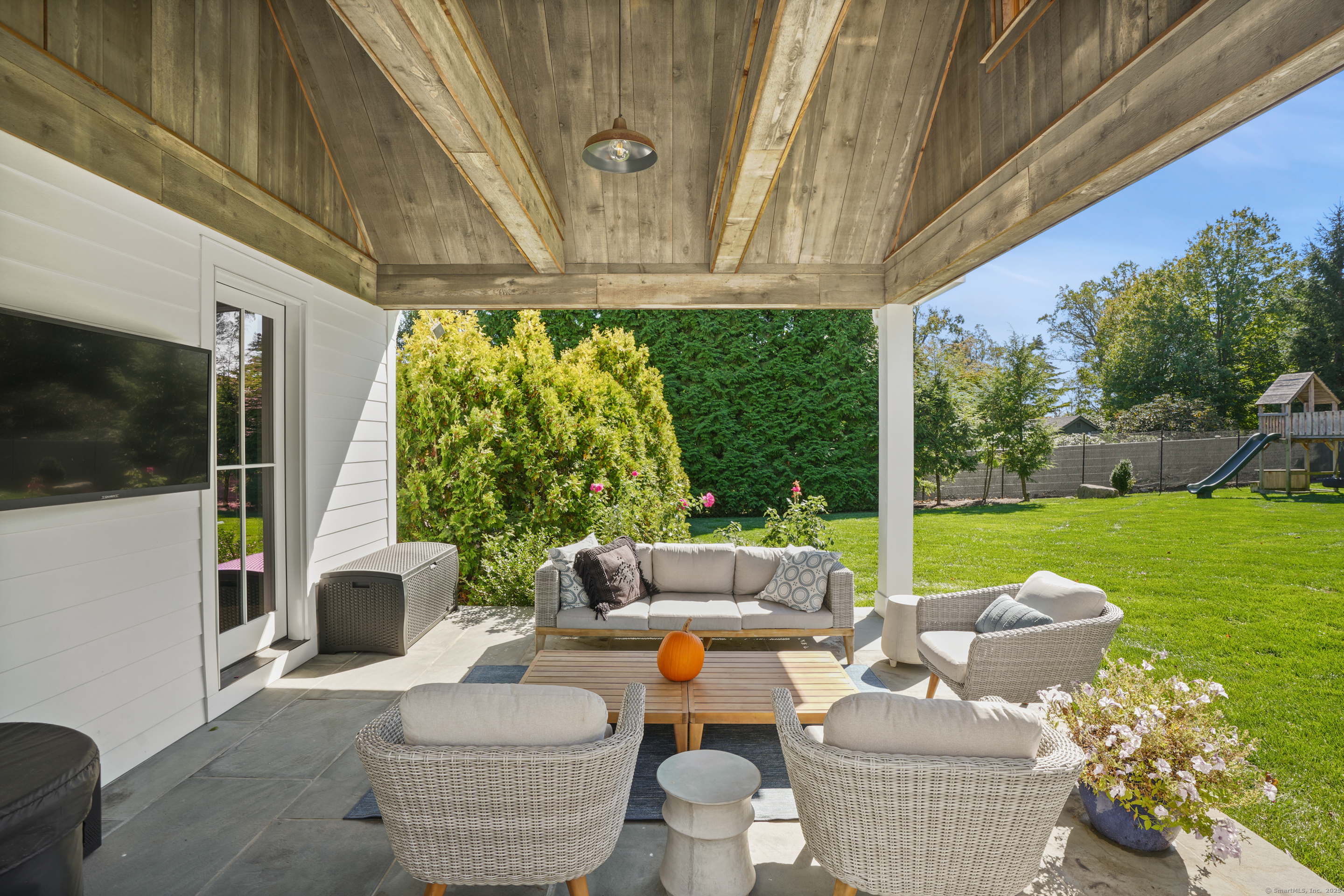 9 Burr Farms Road Westport, CT 06880 - Photo 35 of 40 a outdoor living space with furniture and garden