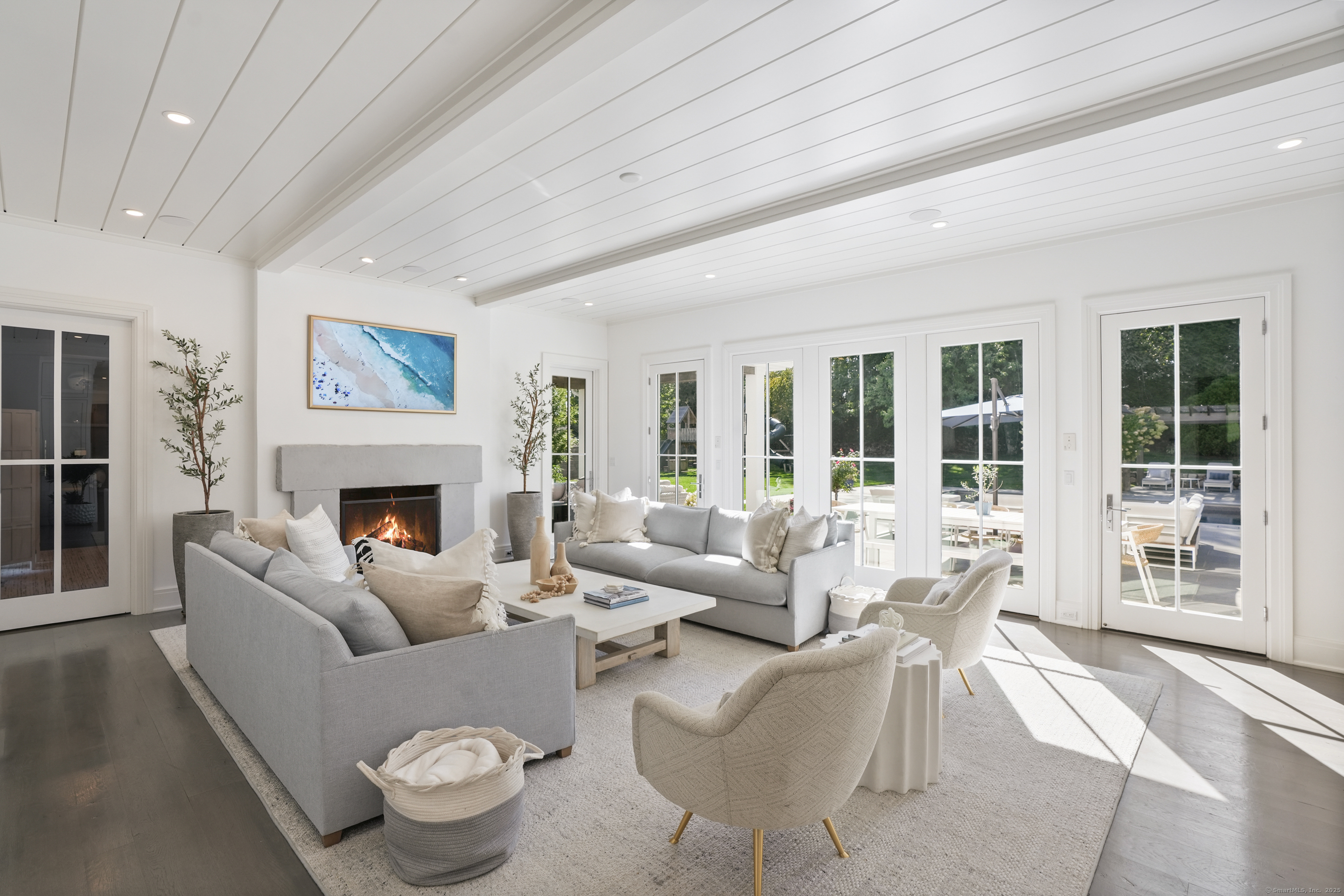 9 Burr Farms Road Westport, CT 06880 - Photo 6 of 40 a living room with furniture and a fireplace