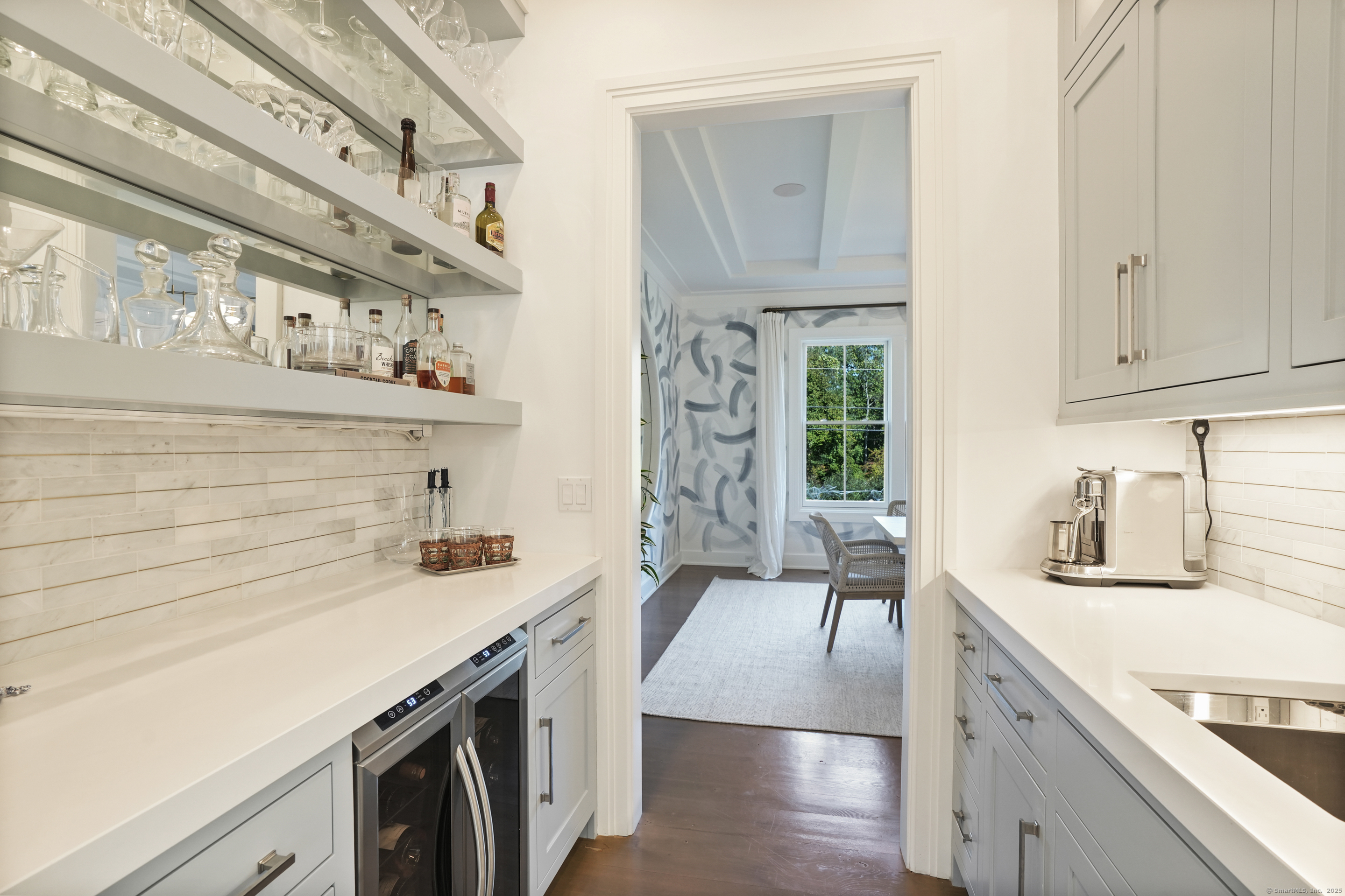 9 Burr Farms Road Westport, CT 06880 - Photo 10 of 40 a kitchen with stainless steel appliances granite countertop a sink stove and cabinets
