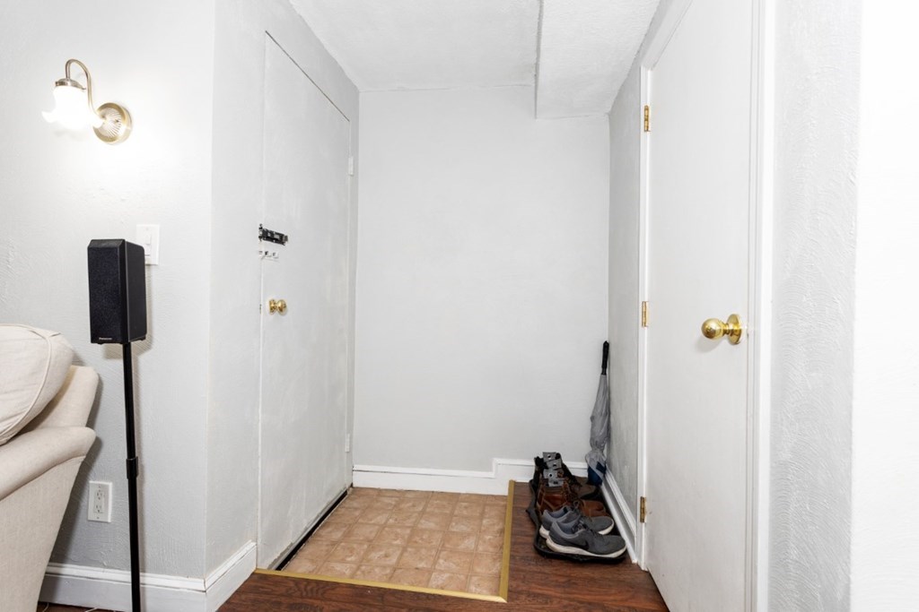 68 Bryon Road, Unit 2 Boston, MA 02467 - Photo 11 of 18 a view of cupboard