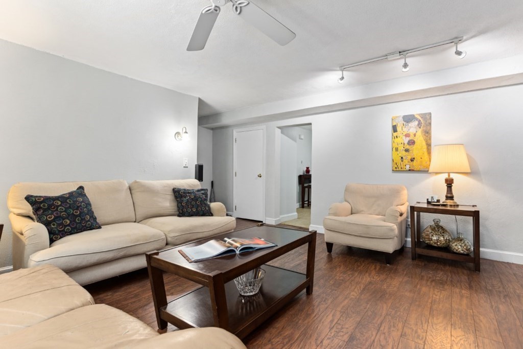 68 Bryon Road, Unit 2 Boston, MA 02467 - Photo 6 of 18 a living room with furniture and wooden floor