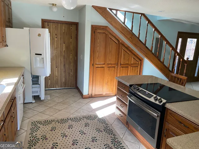 a view of a yard from a balcony