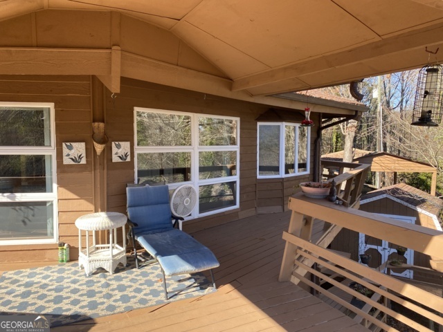 373 Western Way Rabun Gap, GA 30568 - Photo 15 of 30 a view of a chairs and tables in the patio