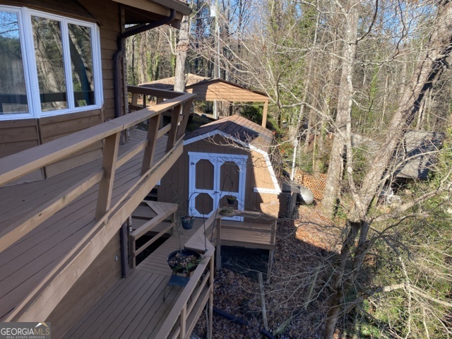 373 Western Way Rabun Gap, GA 30568 - Photo 16 of 30 a view of a chairs and table in the balcony