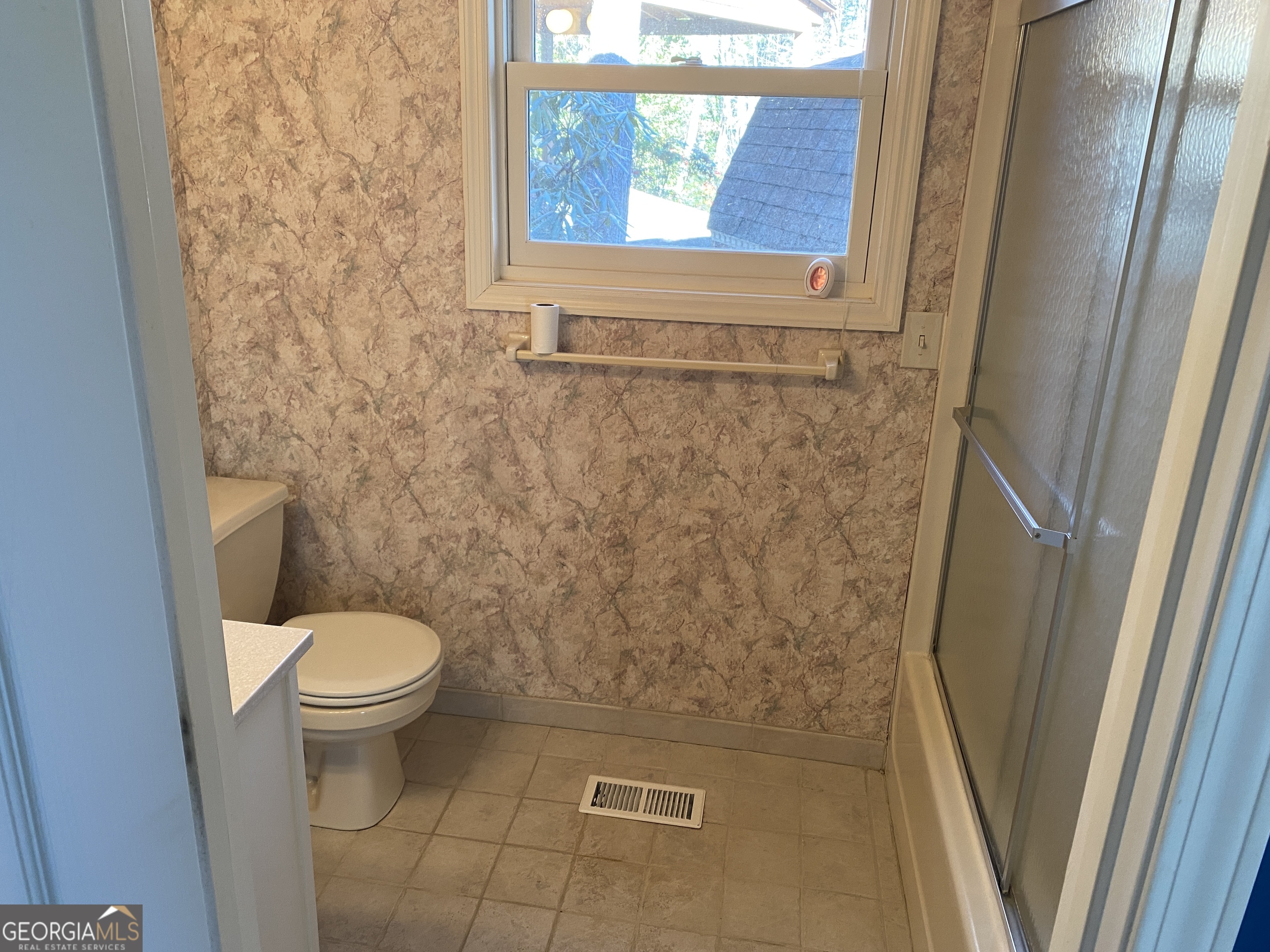 373 Western Way Rabun Gap, GA 30568 - Photo 22 of 30 a bathroom with a toilet and a shower