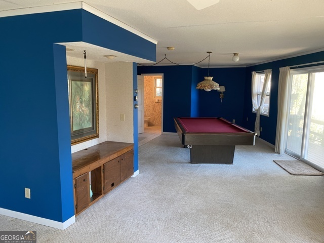 373 Western Way Rabun Gap, GA 30568 - Photo 26 of 30 a spacious bedroom with a bed and a dresser