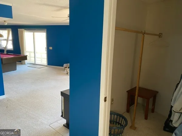 a view of a balcony with wooden floor