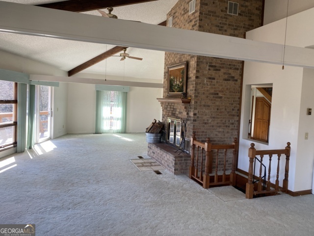 373 Western Way Rabun Gap, GA 30568 - Photo 5 of 30 a view of livingroom with furniture and windows